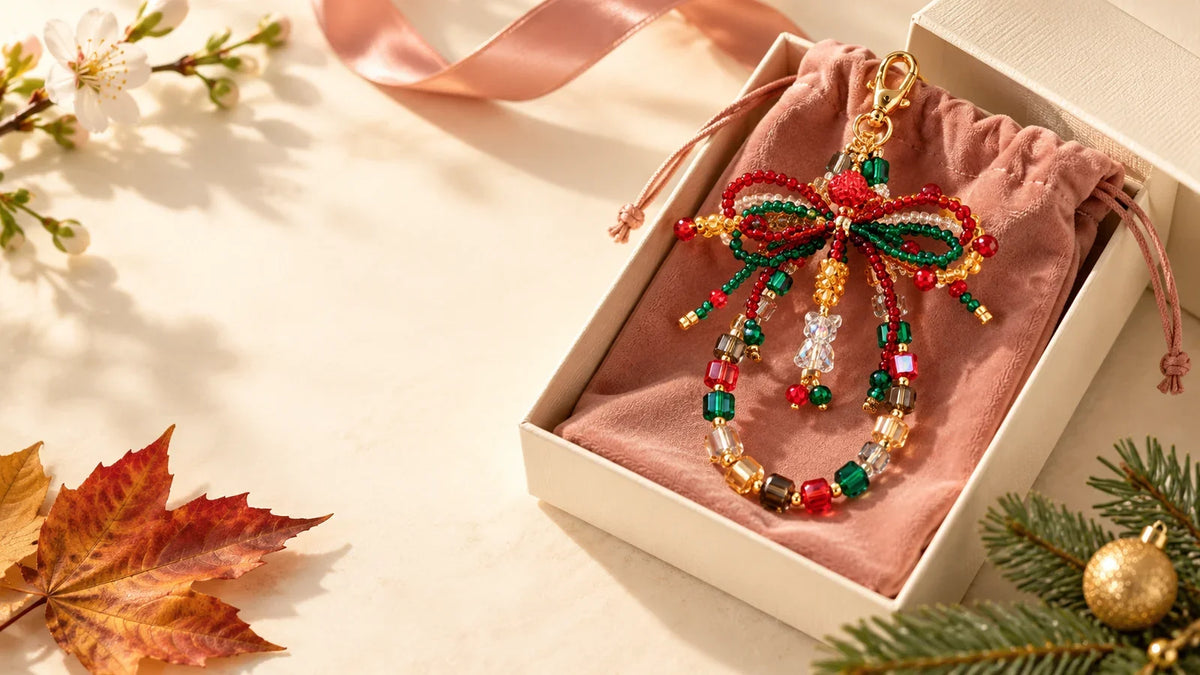 Handmade beaded car charm presented in a gift box with seasonal accents