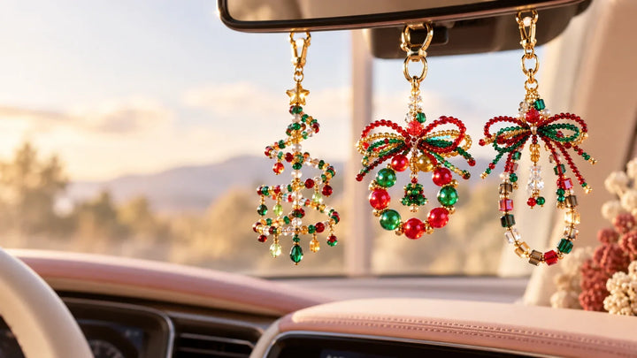 Three handmade beaded rearview mirror charms displayed in a warm car interior